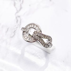 Platinum plated, zircon knot ring